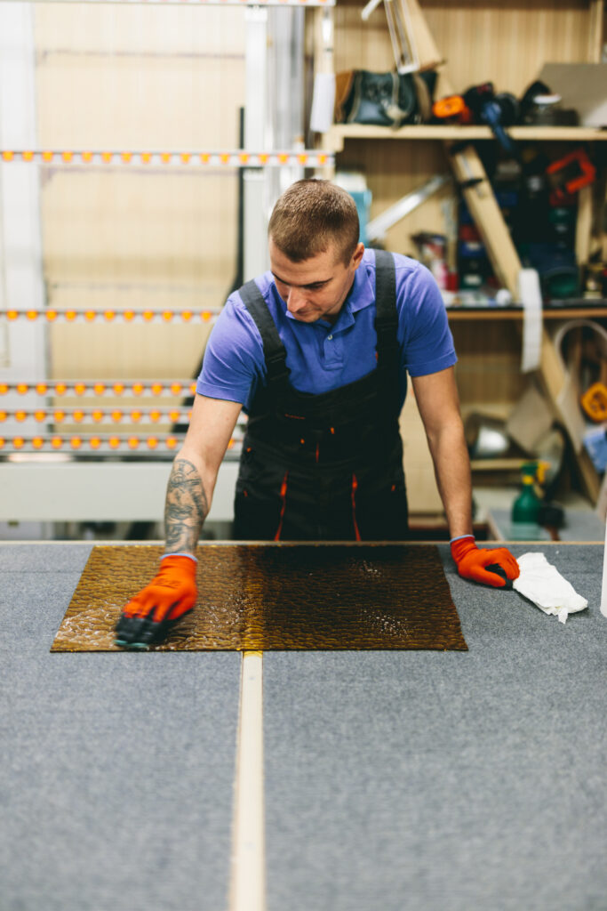 Safety glass being prepared in the Breezy workshop