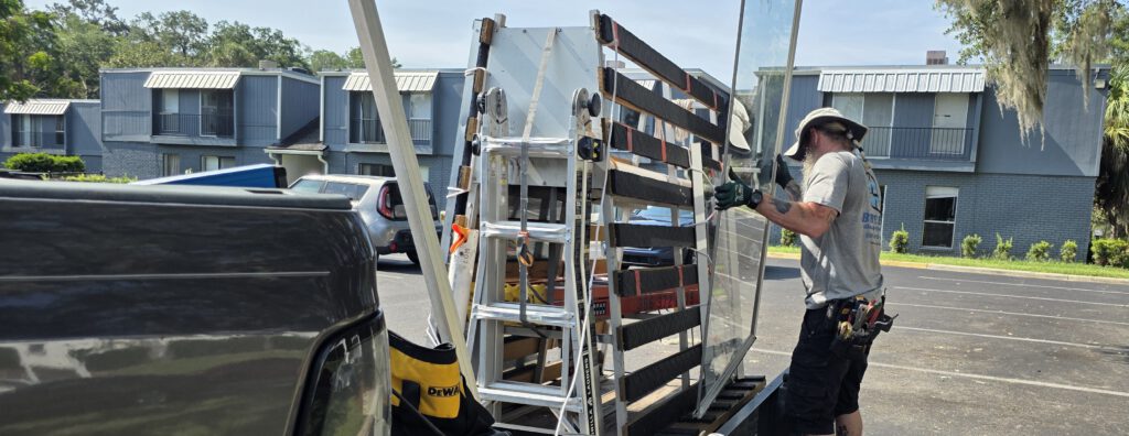 Breezy Glass trailer on site at a property management job